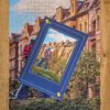 Puzzle 1000 elementów ze zdjęciem pomnika szczecińskiego marynarza i kamienic w tle.